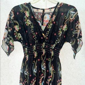 Sheer black dress by Renee C.